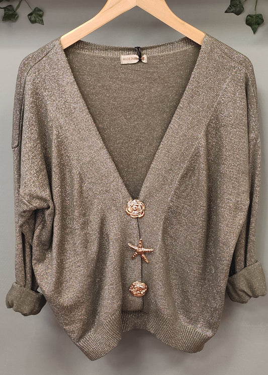 Gilet brillant couleur kaki avec fermeture en broche métallique Vogue N°8