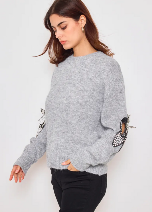 Pull manches longues avec rubans et strass