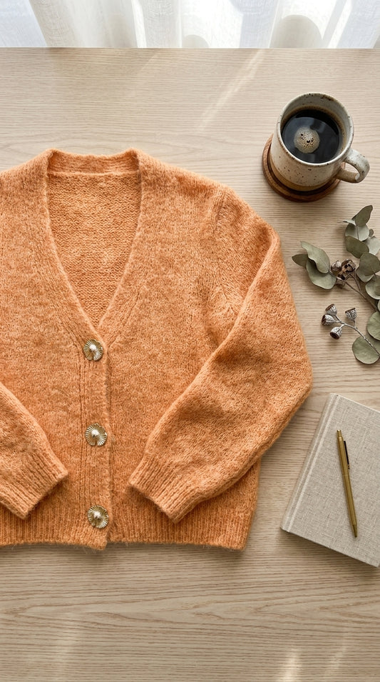 Buttoned cardigan gilet — Flat Lay - Styled | Generated by Modelize