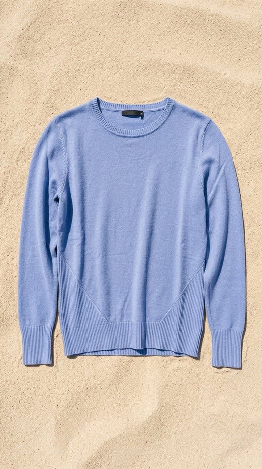 Crew neck sweater — Flat Lay - Swimsuit on Sand | Generated by Modelize