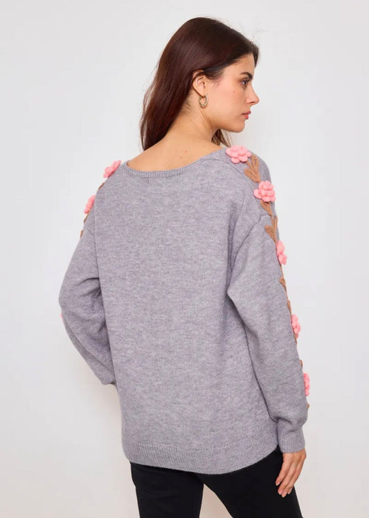 Pull col V avec fleurs sur les manches – Élégant & féminin